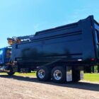 Debris removal Trash Dump truck manufactured by Ledwell featuring Rotobec Loader