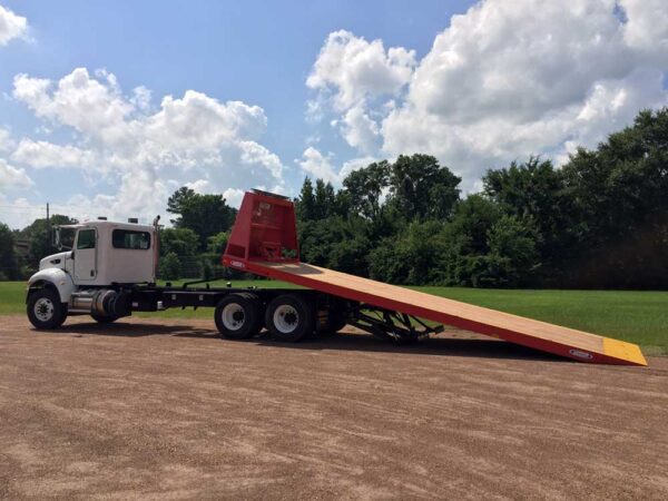 Ledwell Machinery Moving Rollback Truck