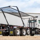 Roll Off Truck with Tarp deployed by Ledwell