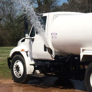 water truck with active side spray nozzle