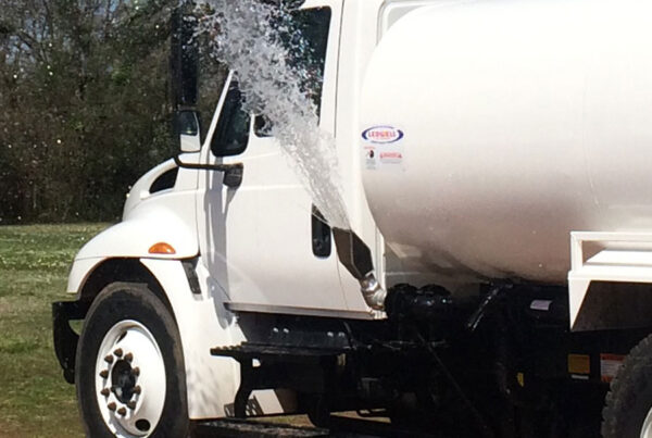 water truck with active side spray nozzle